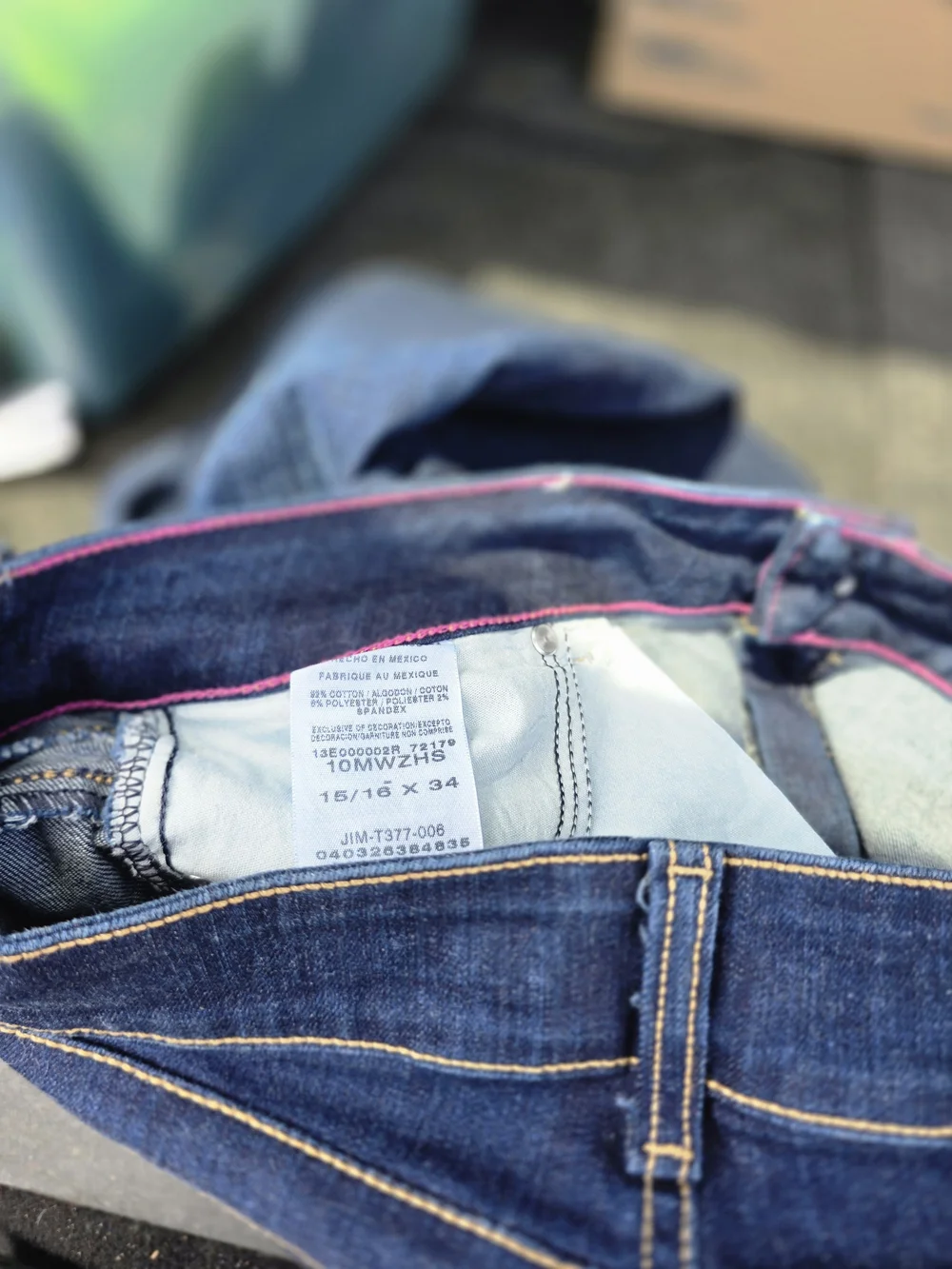 Wrangler High-Rise Women’s Jeans in‎ Dark Blue with Pink Waist Trim